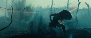 Diana deflects bullets as she crosses No-Mans' land.